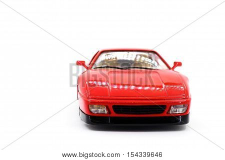 Model of red sports car on a white background closeup