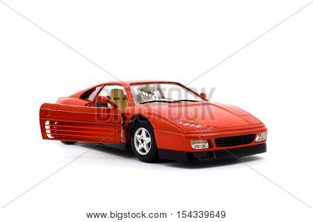 Model of red sports car on a white background closeup