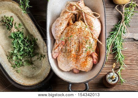 Spiced Chicken With Herbs In Casserole Dish