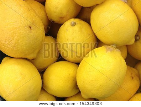 A pile of sour yellow lemon for background