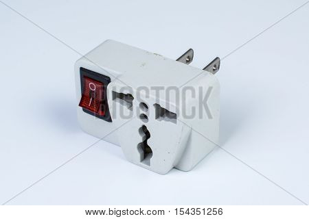 the used plug socket adapter on white background