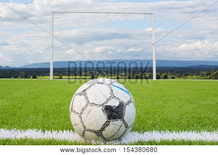 Soccer Ball On Artificial Turf Football Field Green White Grid With Sky Backgound