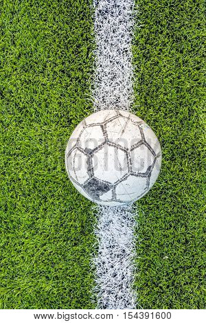 old football on Artificial turf football field green white grid