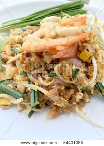 Pad Thai, Stir-fried Rice Noodles With Shrimp In White Dish On White Background. The One Of Thailand