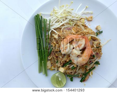 Pad Thai, Stir-fried Rice Noodles With Shrimp In White Dish On White Background. The One Of Thailand