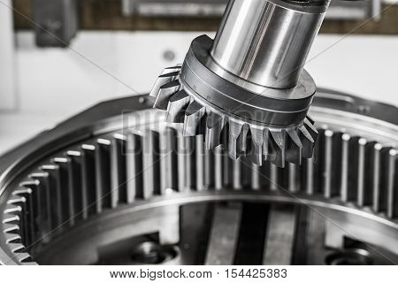 Metalworking CNC milling machine. Cutting metal modern processing technology. Small depth of field. Warning - authentic shooting in challenging conditions. A little bit grain and maybe blurred.