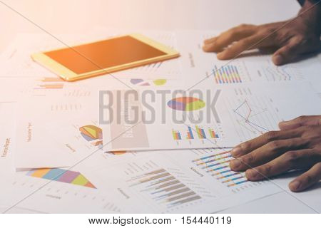Business People Hands Working With A Tablet On White Table Background. Copy Space. Vintage Tone
