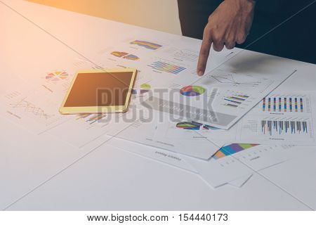 Business People Hands Working With A Tablet On White Table Background. Copy Space. Vintage Tone