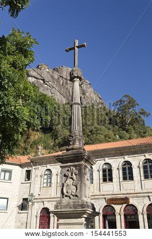 PENEDA, PORTUGAL - October 9, 2016: Detail of the column with a cross on top at the plaza of the Church of Our Lady in the Peneda Geres National Park North of Portugal
