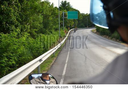 Riding motorcycle on the road, biker on highway