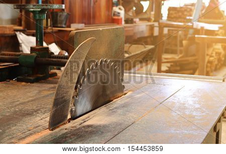 Table saw in workshop.sunshine effect. , table saw for cutting wood