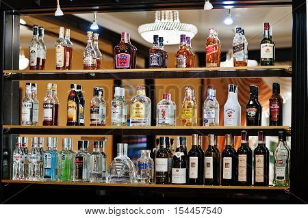 Hai, Ukraine - October 25, 2016: Several Types Of Bottled Alcohol Are Displayed On Some Shelves In A