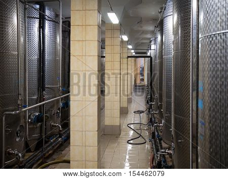 Massandra, Russia - November 09, 2015: Metal containers for wine in the heat treatment the shop of winery Massandra Crimea