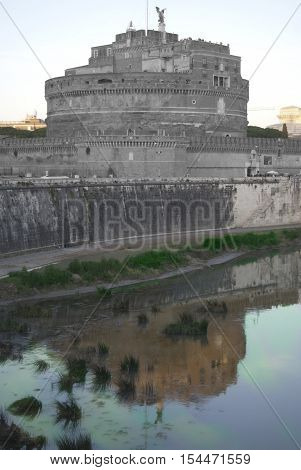 ancient fortress of Castel Sant'Angelo in Rome reflected in Tiber river