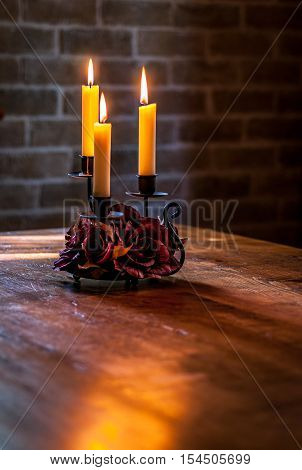glowing candles on a beautifull candlelight on a table
