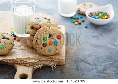Chocolate chip and candy cookies with milk