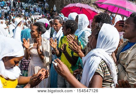 Gondar Ethiopia - January 19 2016: A crowd of local faithfuls attends the procession in the annual religious celebration of Timket (epiphany)