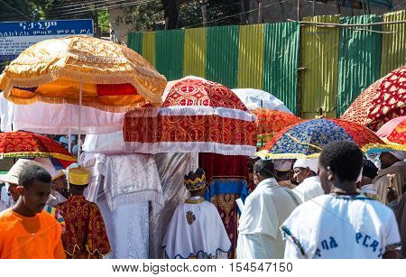 Gondar Ethiopia - January 19 2016: Orthodox priests attends the procession in the annual religious celebration of Timket (epiphany)