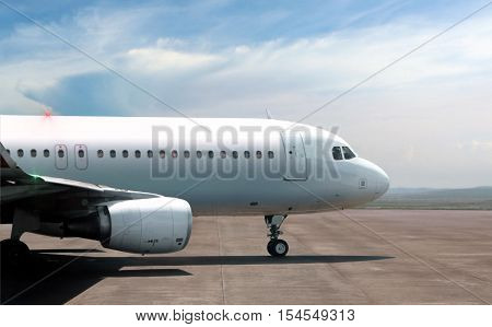 Airplane ready to take off from side view