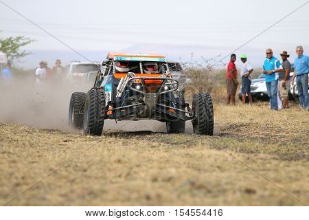 Speeding Orange Zarco Rally Car At Start Of Race