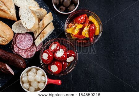 Spanish Tapas With Slices Jamon Serrano And Grilled Pepper. Also