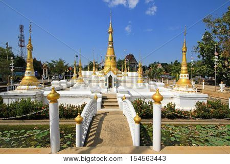 Wide angle view ,Golden pagodas in  Mon-style Chedi of Wat Chedi Thong, The temple's architecture imitates the Burmese 