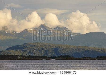 Norwegian fjord landscape. Mountains and forest. Visit Norway. Tourism