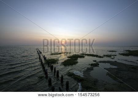 High tide and sunset at the Wadden Sea on Mando. Danish Wadden Sea National Park.
