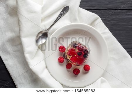 Berry jelly on a plate top view