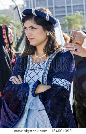 CAGLIARI, ITALY - October 29, 2016: Invitas waterfront Porto Sardinia performances of traditions and food. - Portrait of a beautiful girl of the 
