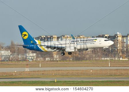 Borispol Ukraine - November 13 2010: Air Ukraine International Boeing 737NG is on final ladning on the runway in the airport