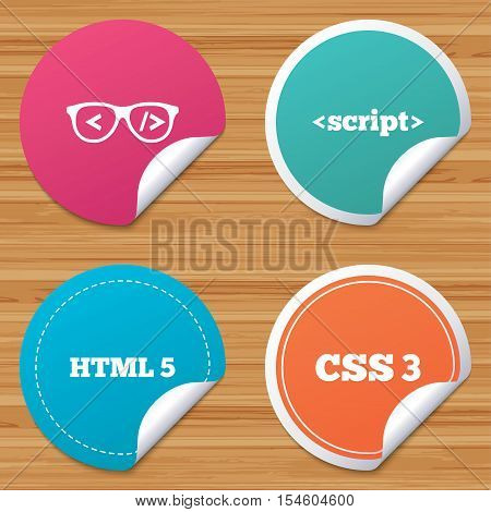 Round stickers or website banners. Programmer coder glasses icon. HTML5 markup language and CSS3 cascading style sheets sign symbols. Circle badges with bended corner. Vector