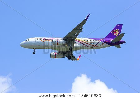 CHIANGMAI , THAILAND -APRIL 1 2014: HS-TXO Airbus A320-200 of Thaismile airway. Landing to Chiangmai airport from Phuket.