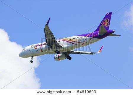 CHIANGMAI , THAILAND -APRIL 1 2014: HS-TXO Airbus A320-200 of Thaismile airway. Landing to Chiangmai airport from Phuket.