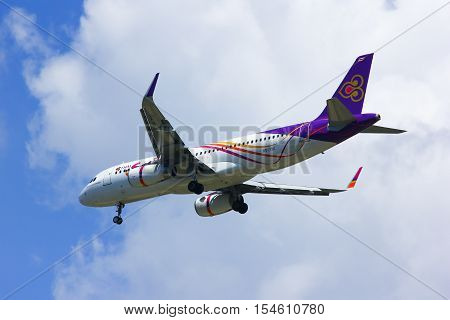 CHIANGMAI , THAILAND -APRIL 1 2014: HS-TXO Airbus A320-200 of Thaismile airway. Landing to Chiangmai airport from Phuket.