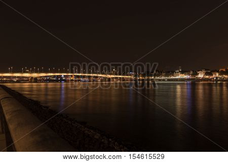 Illuminated bridge of Deutz by night, Cologne, Germany