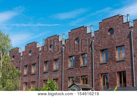 Serial houses with red bricks seen in Berlin, Germany