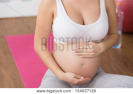 Pregnant Woman Doing Breathing Exercise