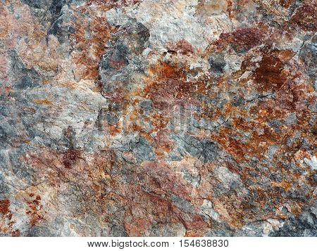 Brown rock seamless abstract background. Surface of old stone.