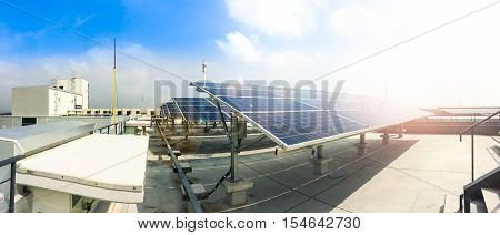 Soft Focus Of Solar Panels Or Solar Cells On Factory Rooftop Or Terrace With Sun Light, Industry In