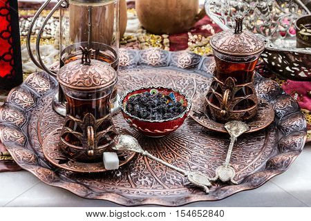 Turkish traditional tea table appointments - glasses, Turkey.