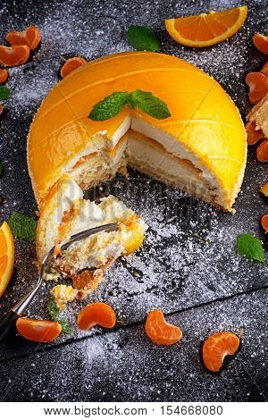 Cake witch Orange mousse, Mandarin saucea and fruit.