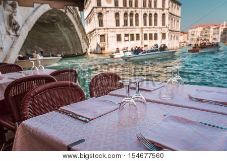 Dinner in Vanice at Grand Canal in hot summer