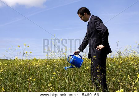 az a mező, a Virágtartó a kezében üzletember