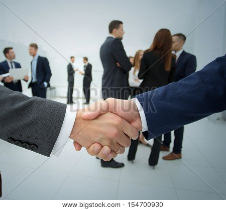 Business handshake. Business handshake and business people conce