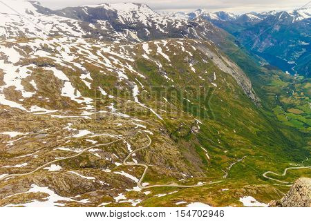 Tourism vacation and travel. Fantastic view on Geirangerfjord and mountains landscape from the Dalsnibba Plateau viewpoint Norway Scandinavia.