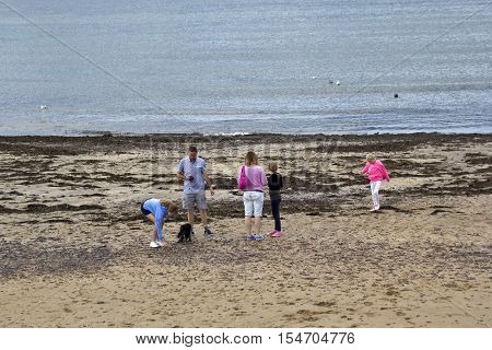 Tourists having fun in Eyemouth in Scotland UK. 07.08.2015