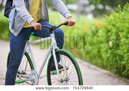 Cropped image of man on bicycle outdoors