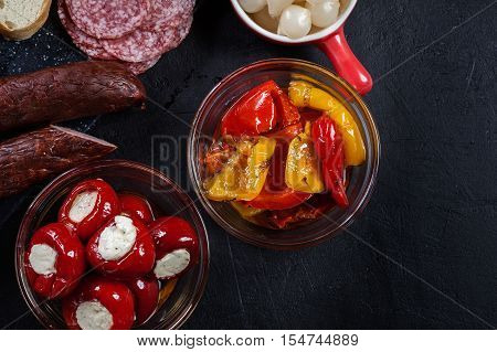 Spanish Tapas With Slices Jamon Serrano And Grilled Pepper. Also