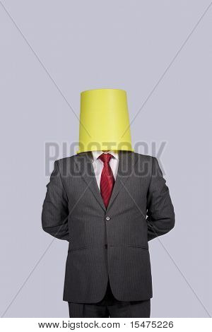 businessman with a bucket on his head